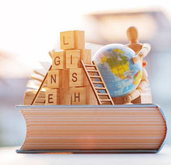 English book and learning blocks.